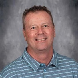 A person in a striped shirtDescription automatically generated with low confidence